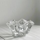 Empty pocket ashtray in transparent crystal organic shape.