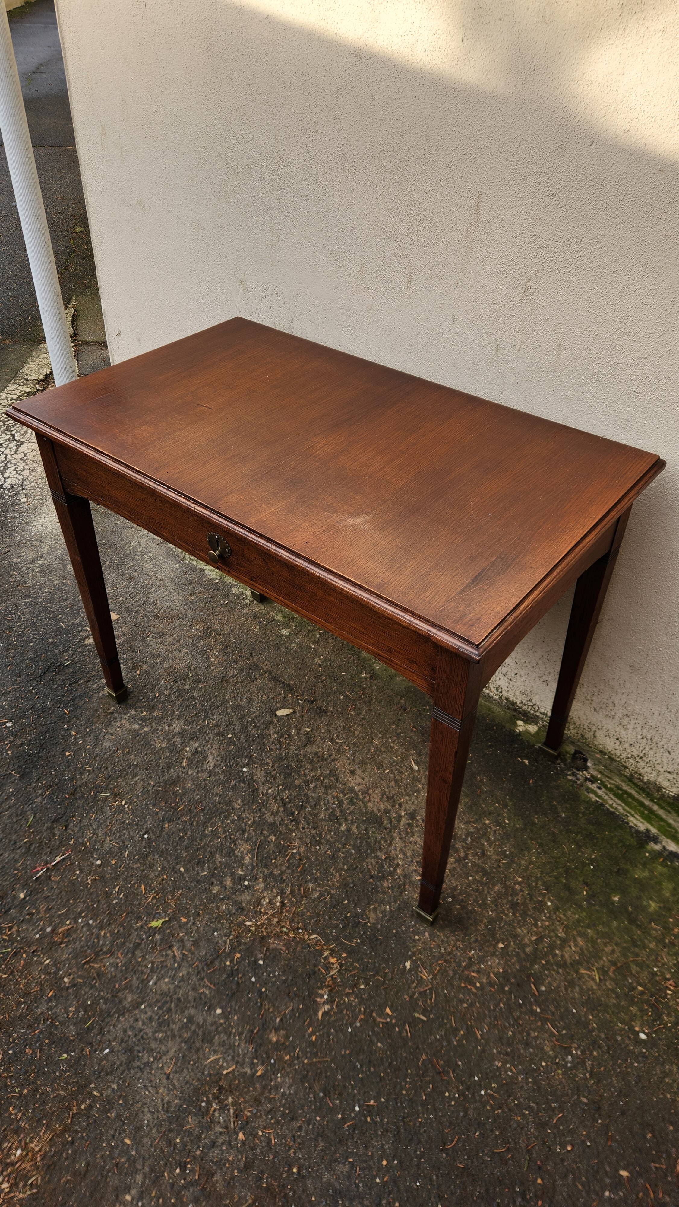 Vintage wooden desk from the 19th century, Louis XVI style.