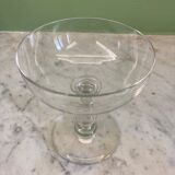 4 Baccarat crystal champagne coupes in a gondola shape.