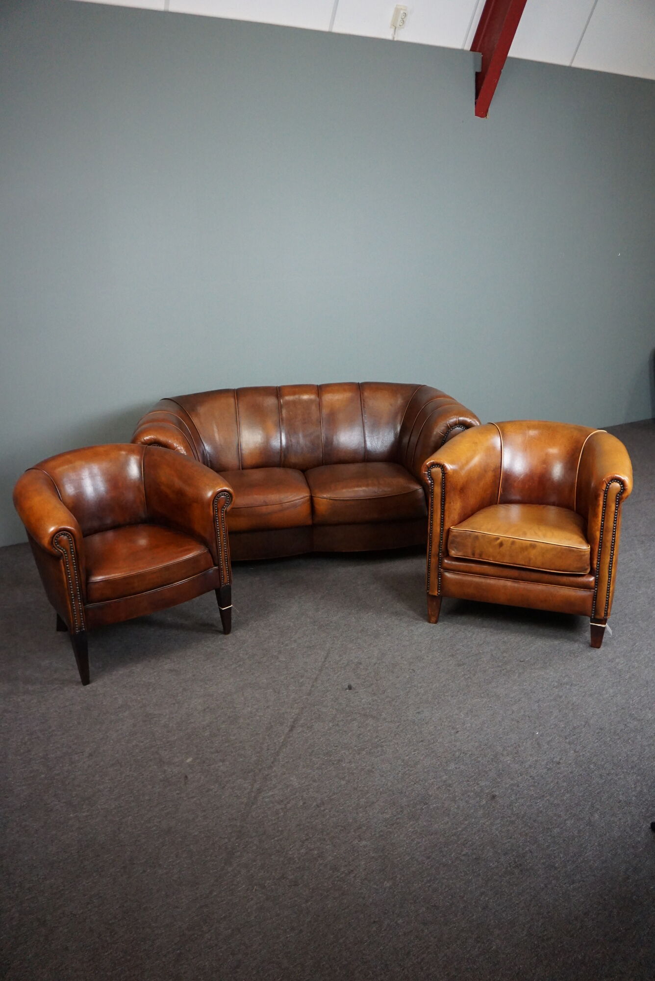 Beautiful sheep leather set of two club chairs and a 2 seater sofa