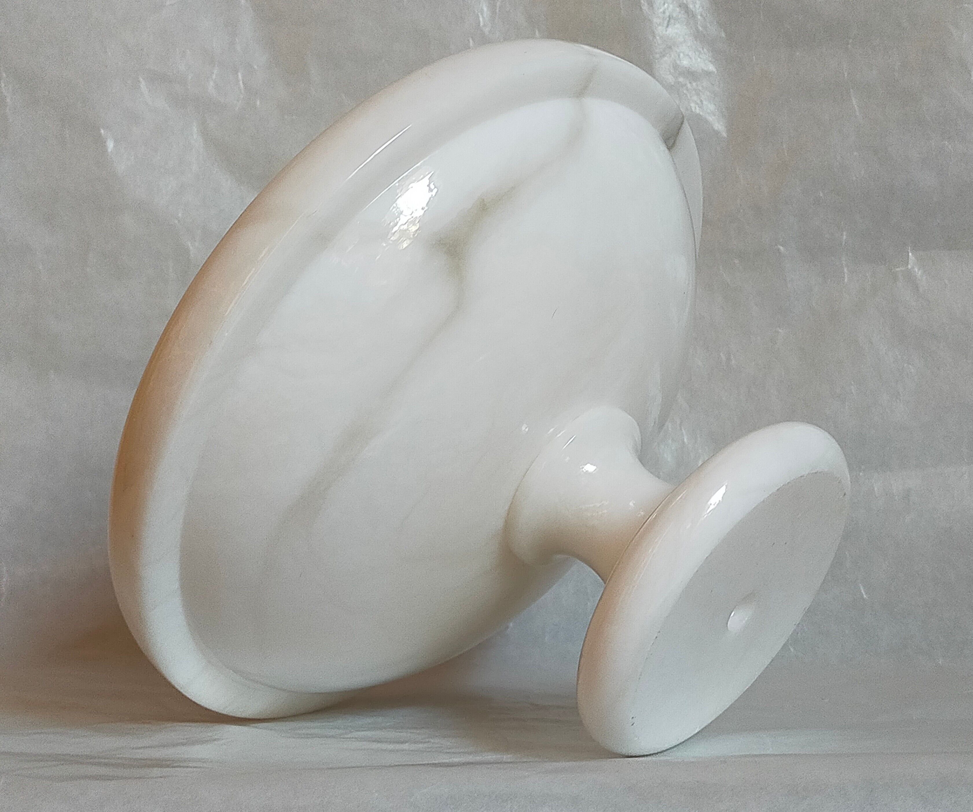 Standing cup in old white marble