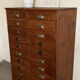 Old apothecary trade furniture in vintage wood 24 drawers.