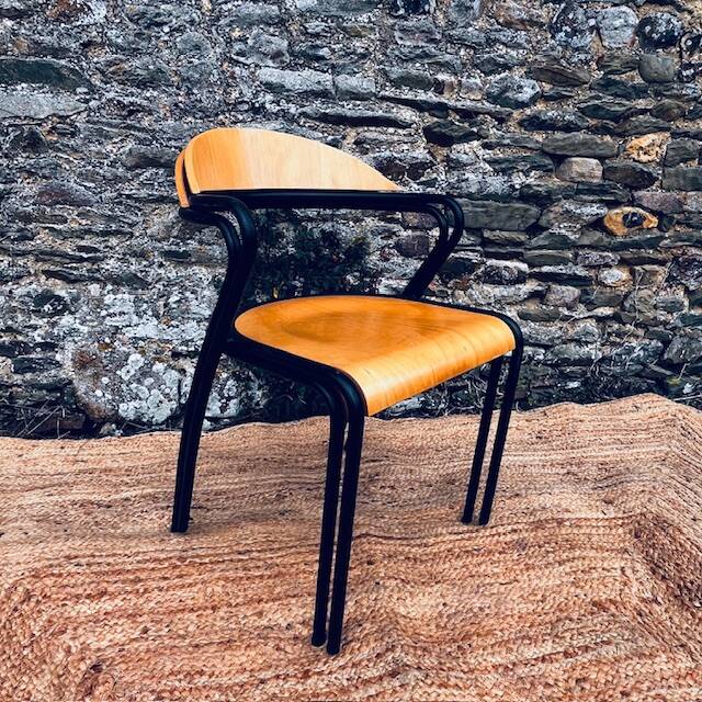 Pair of wooden and black metal chairs