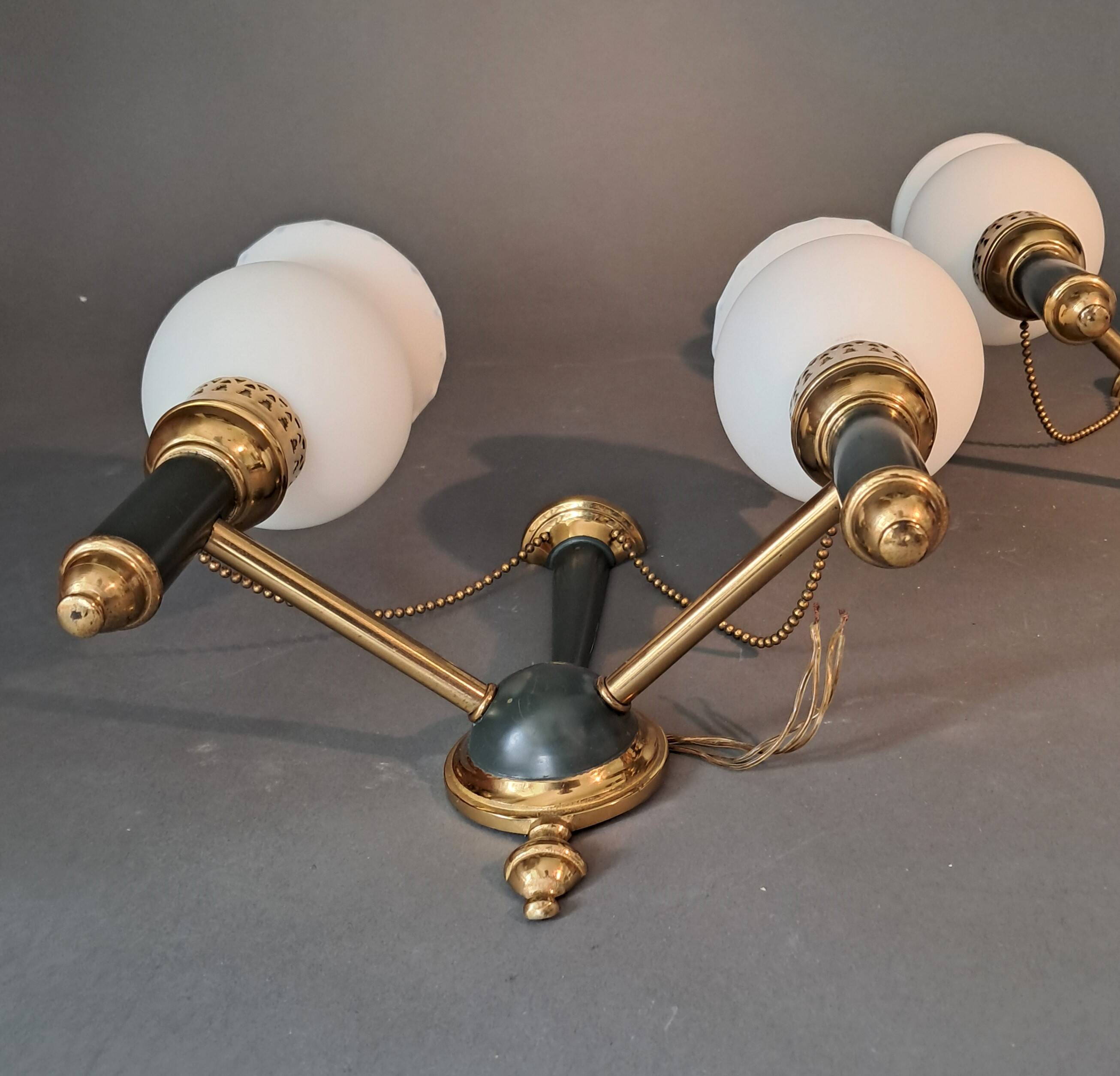 Pair of two-light sconces from Maison Lunel 1960.