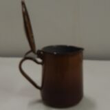 Former enamelled milk pitcher