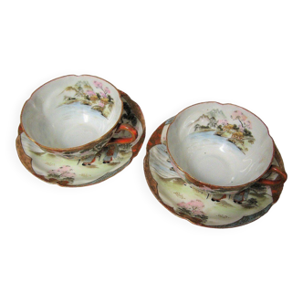 Pair of cups and under cups in fine porcelain from china xixth.