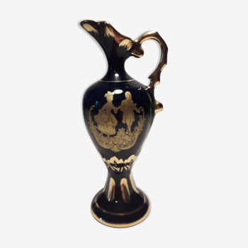 Old ewer in Limoges porcelain blue oven and gold