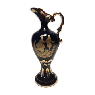 Old ewer in Limoges porcelain blue oven and gold