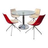 Guzzini dining set, round glass table and 4 shell chairs.