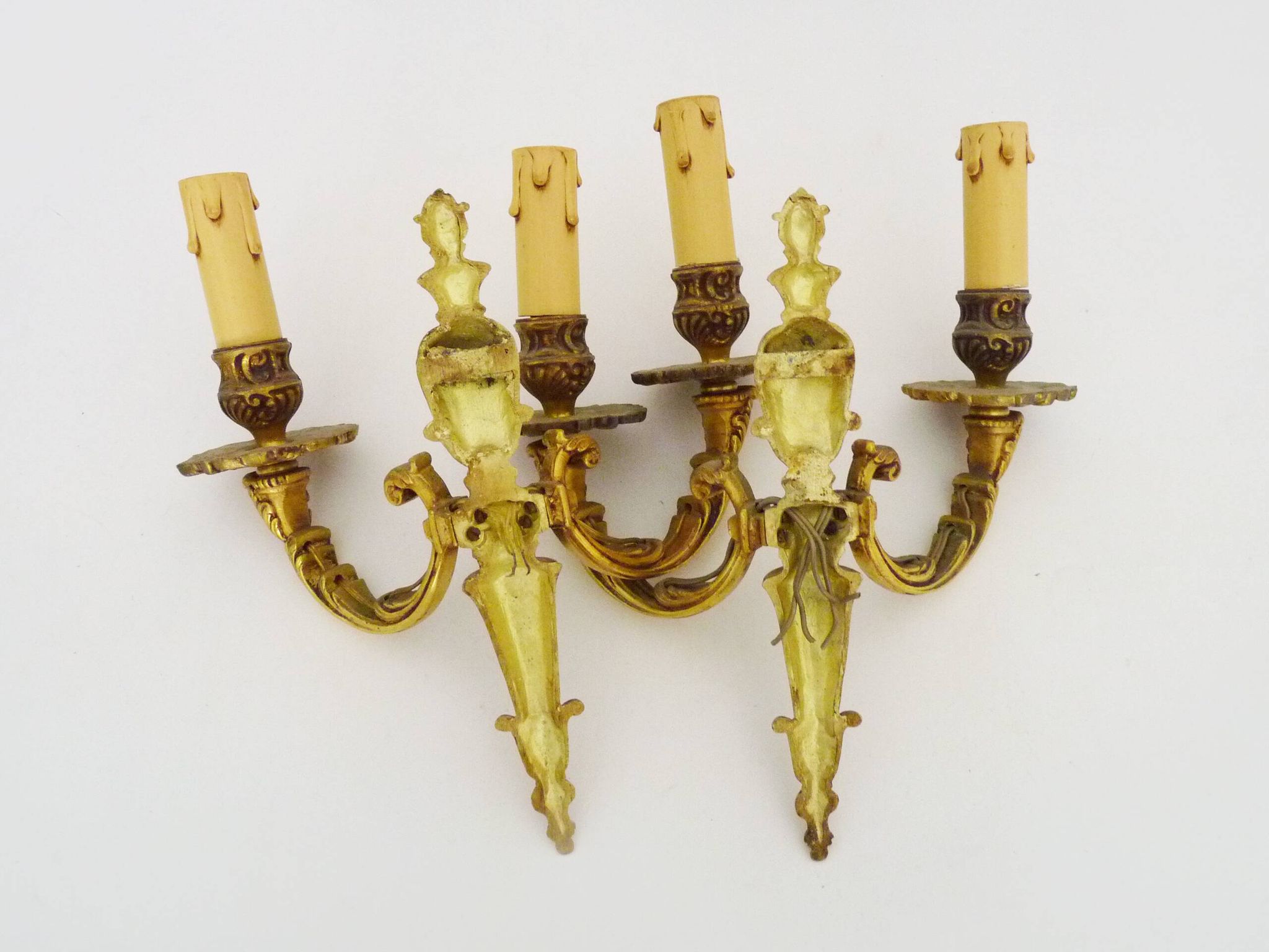 Old pair of bronze double-light wall sconces. 60s