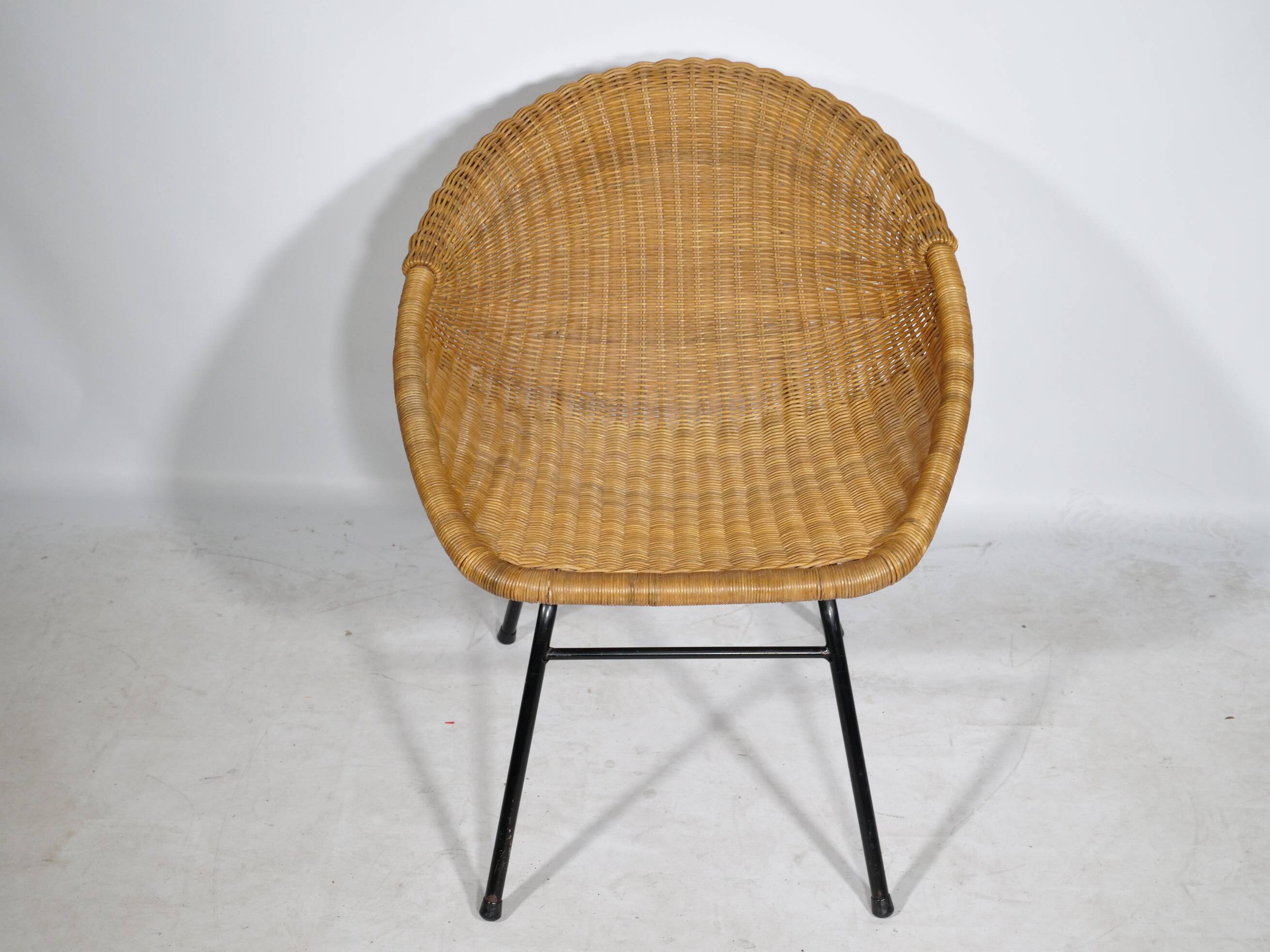 Woven rattan armchair from the 1960s