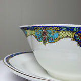 Old Lunéville sauce boat, opaque porcelain with polychrome decoration.