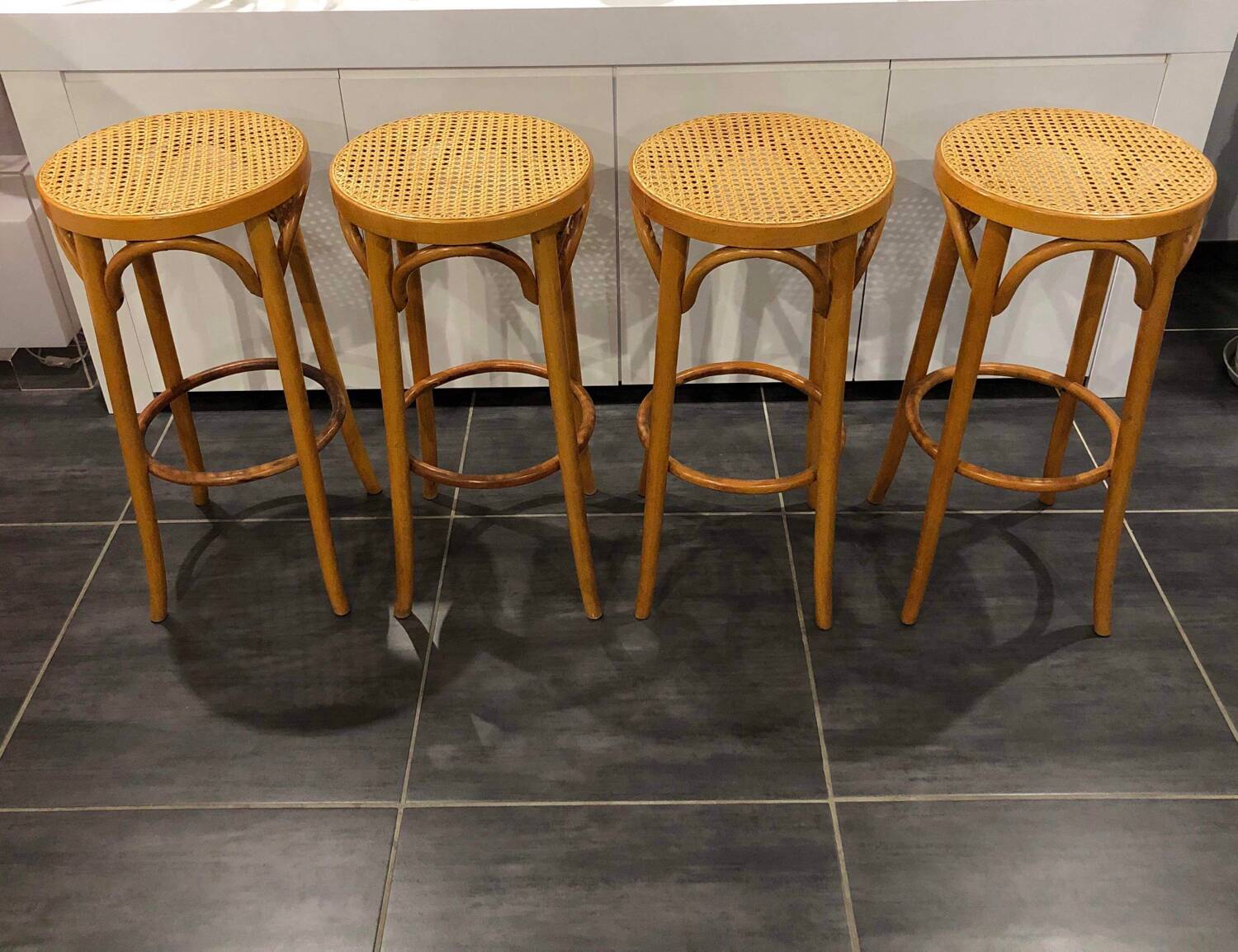 Set of 4 traditional cane stools