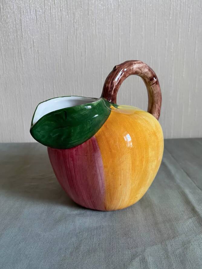 Earthenware pitcher evoking a fruit