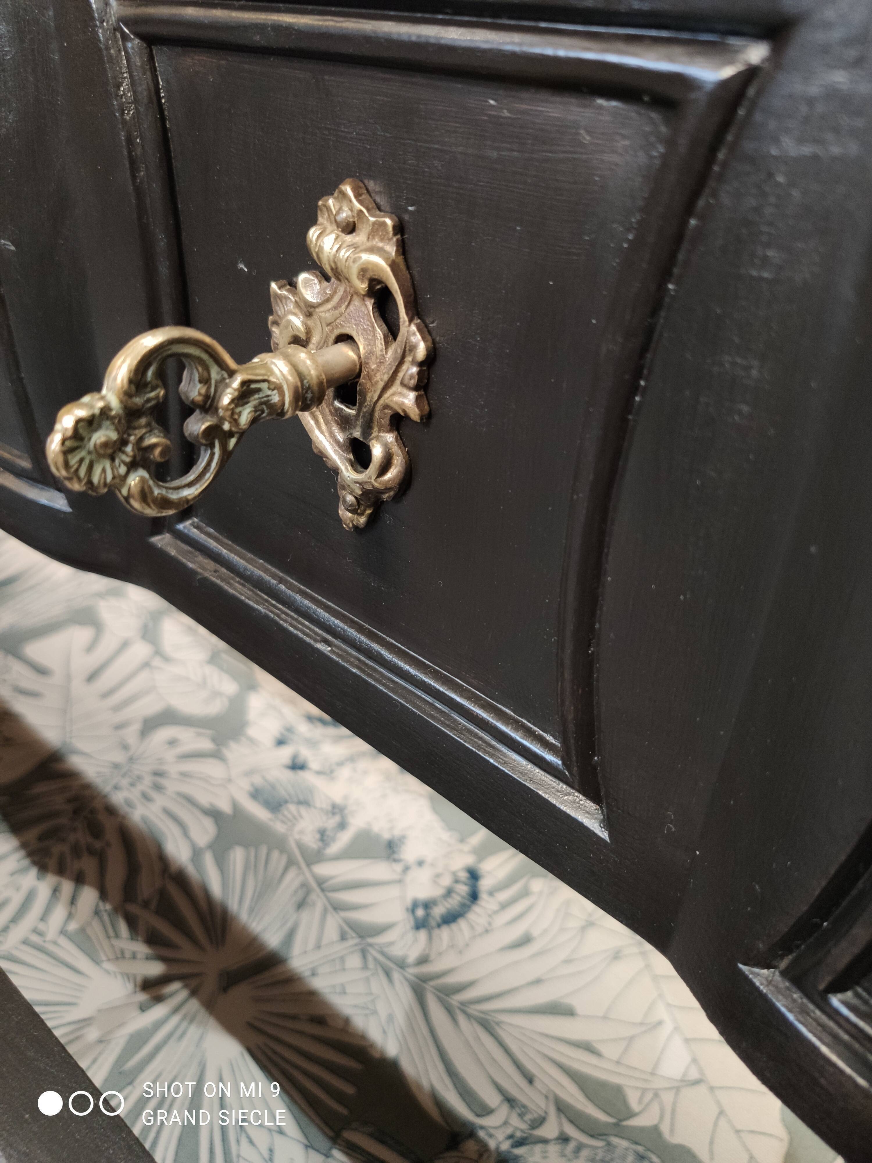 Antique black patinated chest of drawers