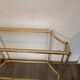 Console "Hollywood Regency" en laiton, plexiglas et verre, circa 1970
