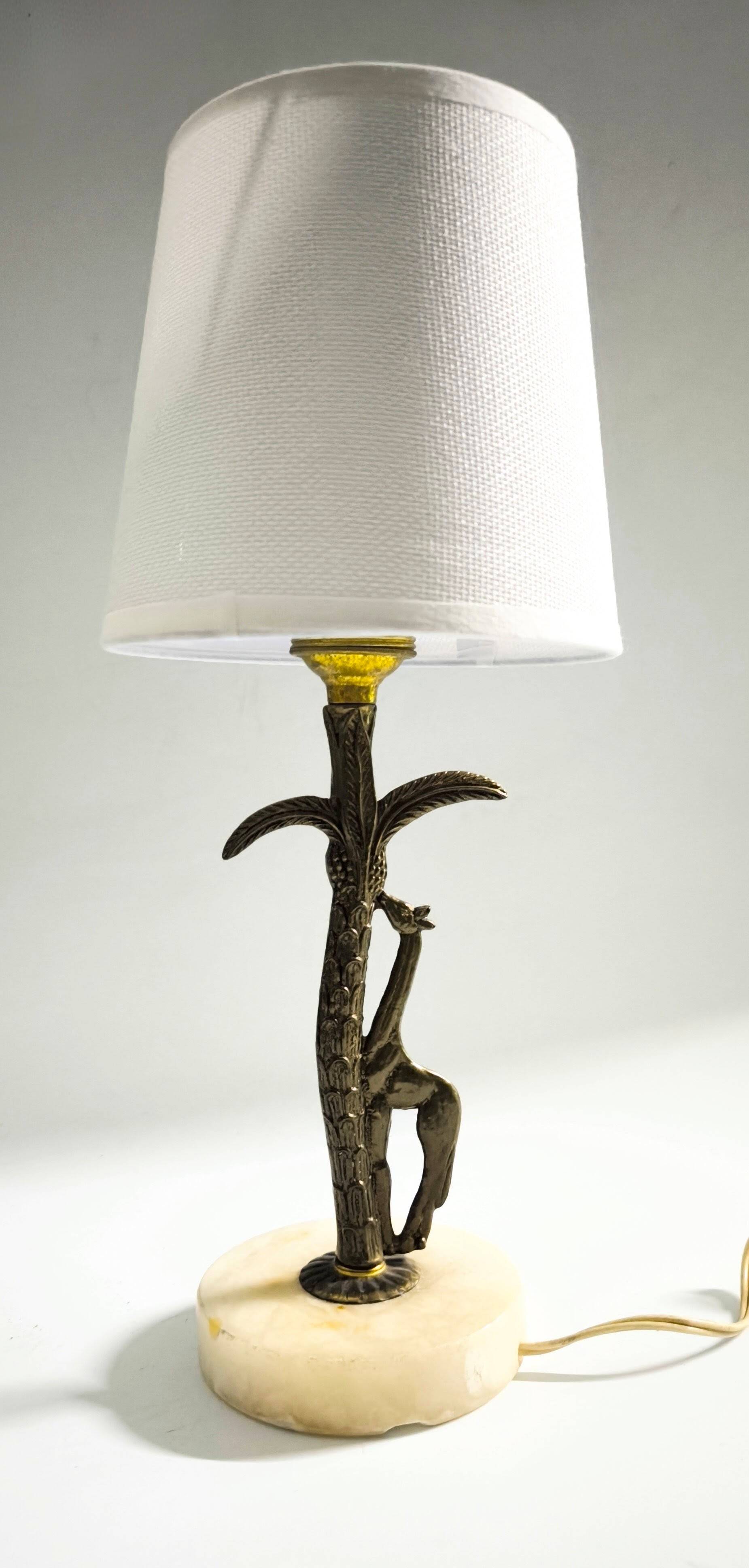Bronze and marble lamp in Hollywood Regency style.