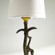 Bronze and marble lamp in Hollywood Regency style.