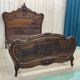 Louis XV style bed in walnut from the 1900s