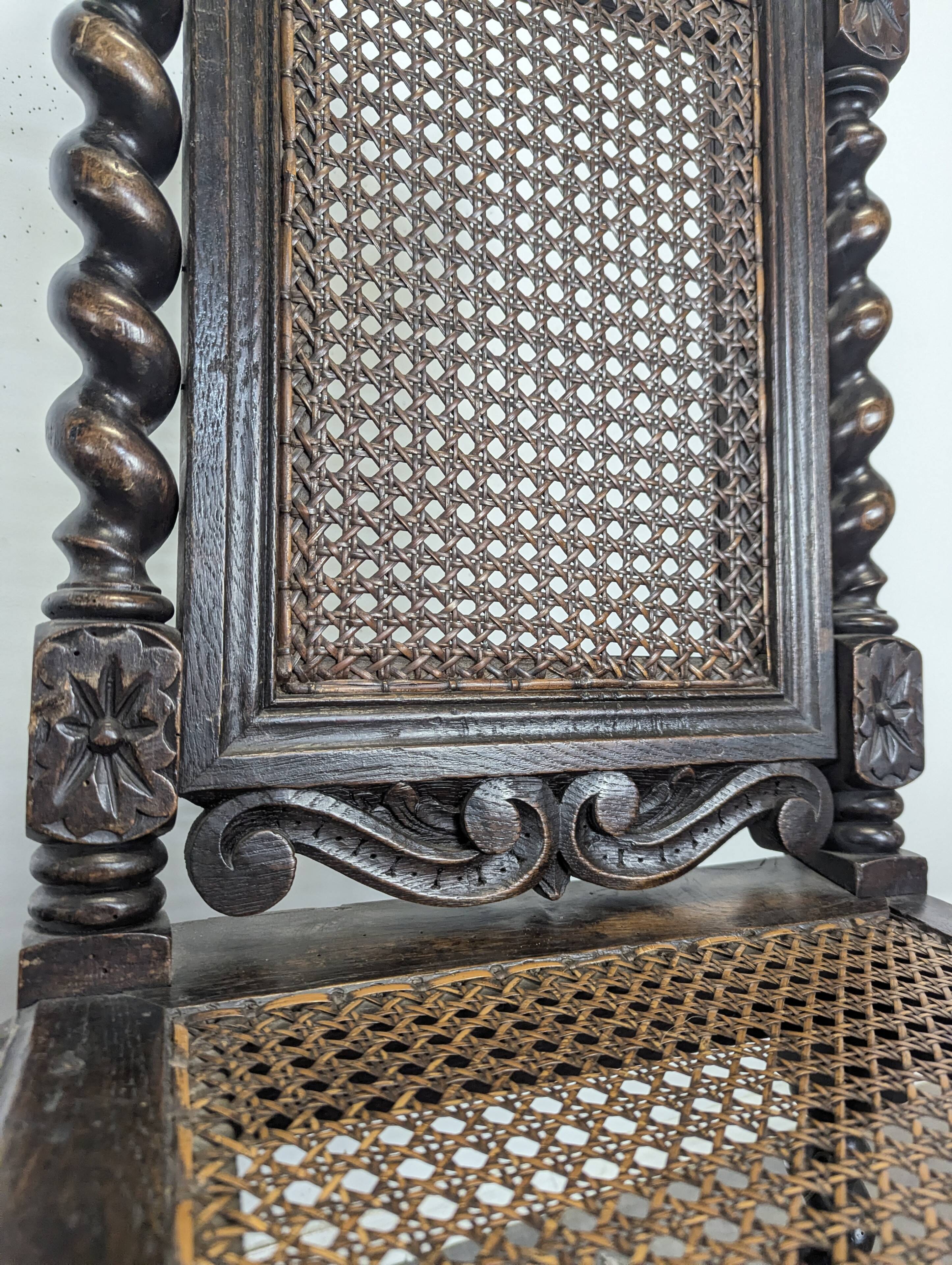 Pair of Louis XIII chairs in twisted oak with caning.