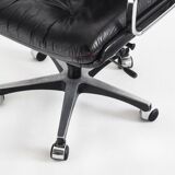 Vintage leather armchair. Swivel, on casters, multi-position. Norway, 1970s.