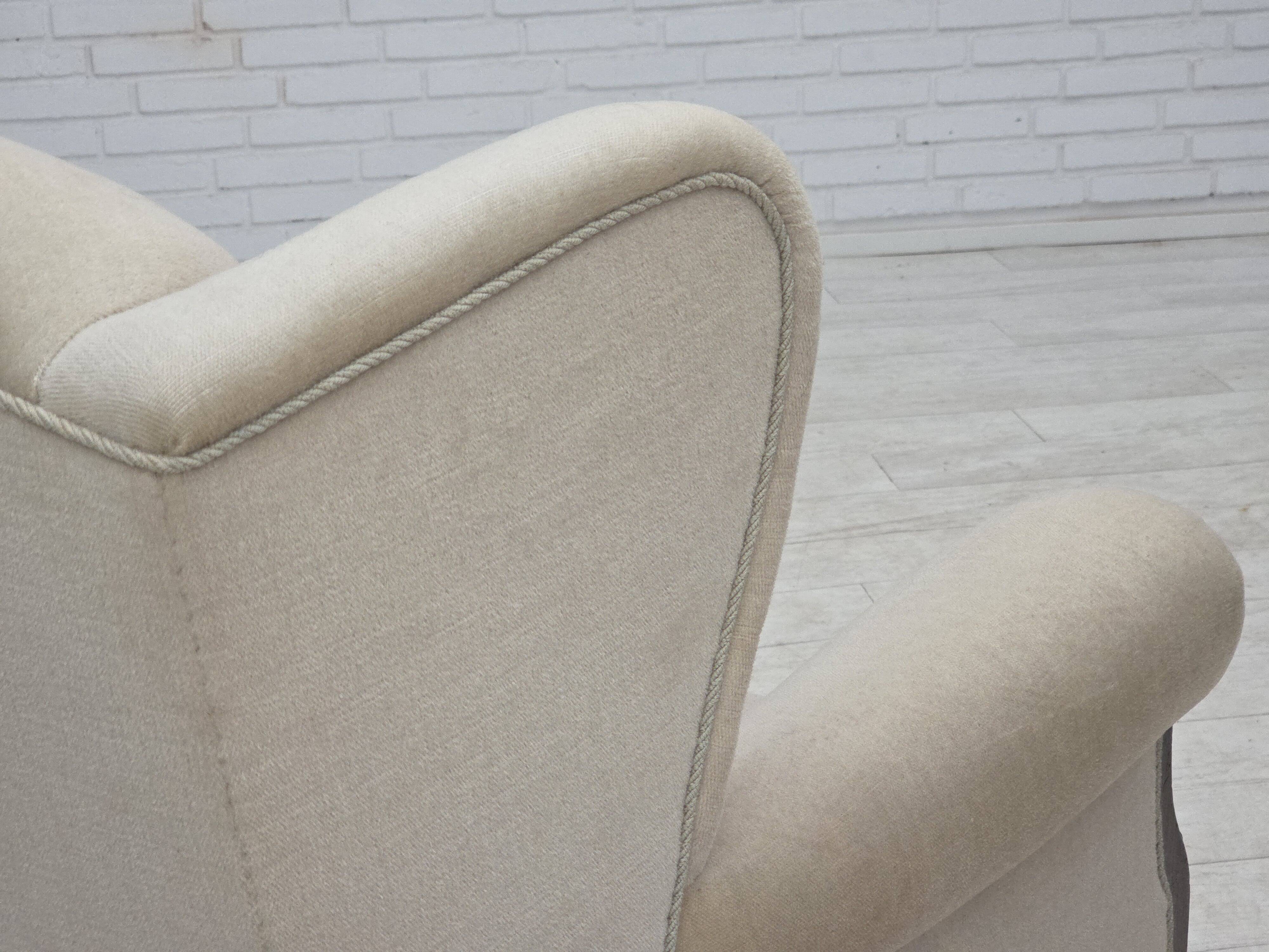 1960s, Danish wingback armchair, furniture velour, carved oak wood.