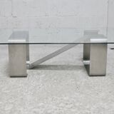 Coffee table with "kinetic" steel base and glass slab. Circa 1970.