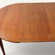Table ronde de repas extensible danoise en teck – Années 1960