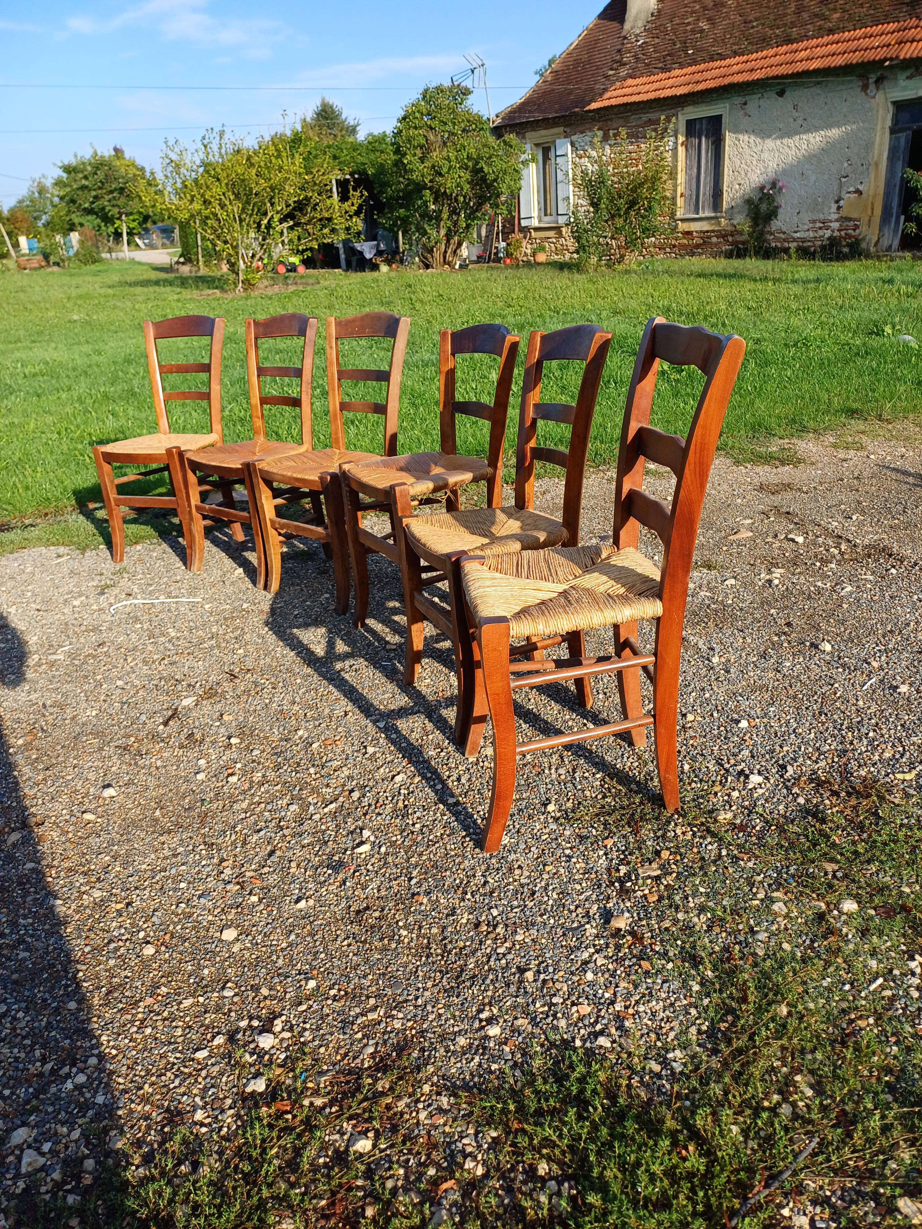 6 old straw chairs