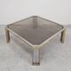 Large modernist coffee table attributed to Romeo Rega in steel and brass plating.