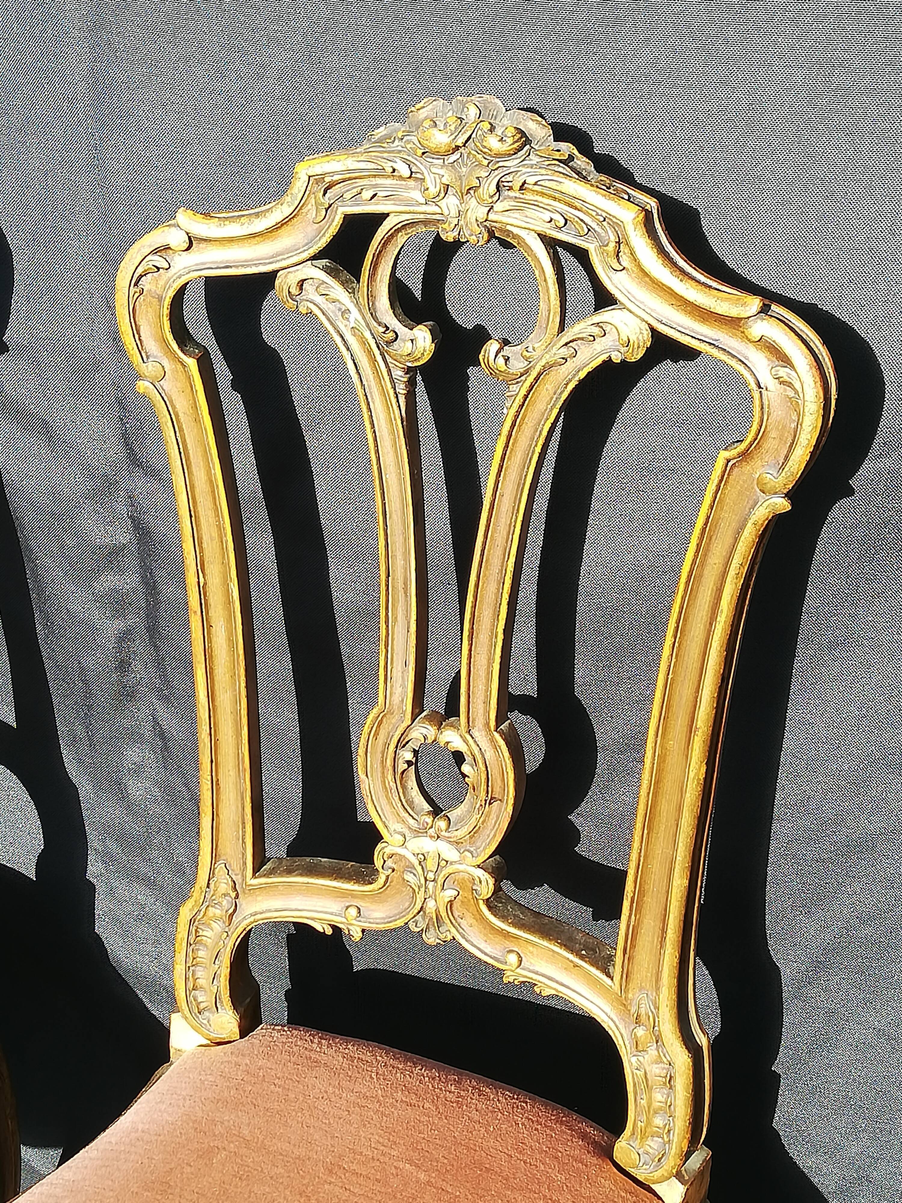 Pair of old canne chairs in gilded wood