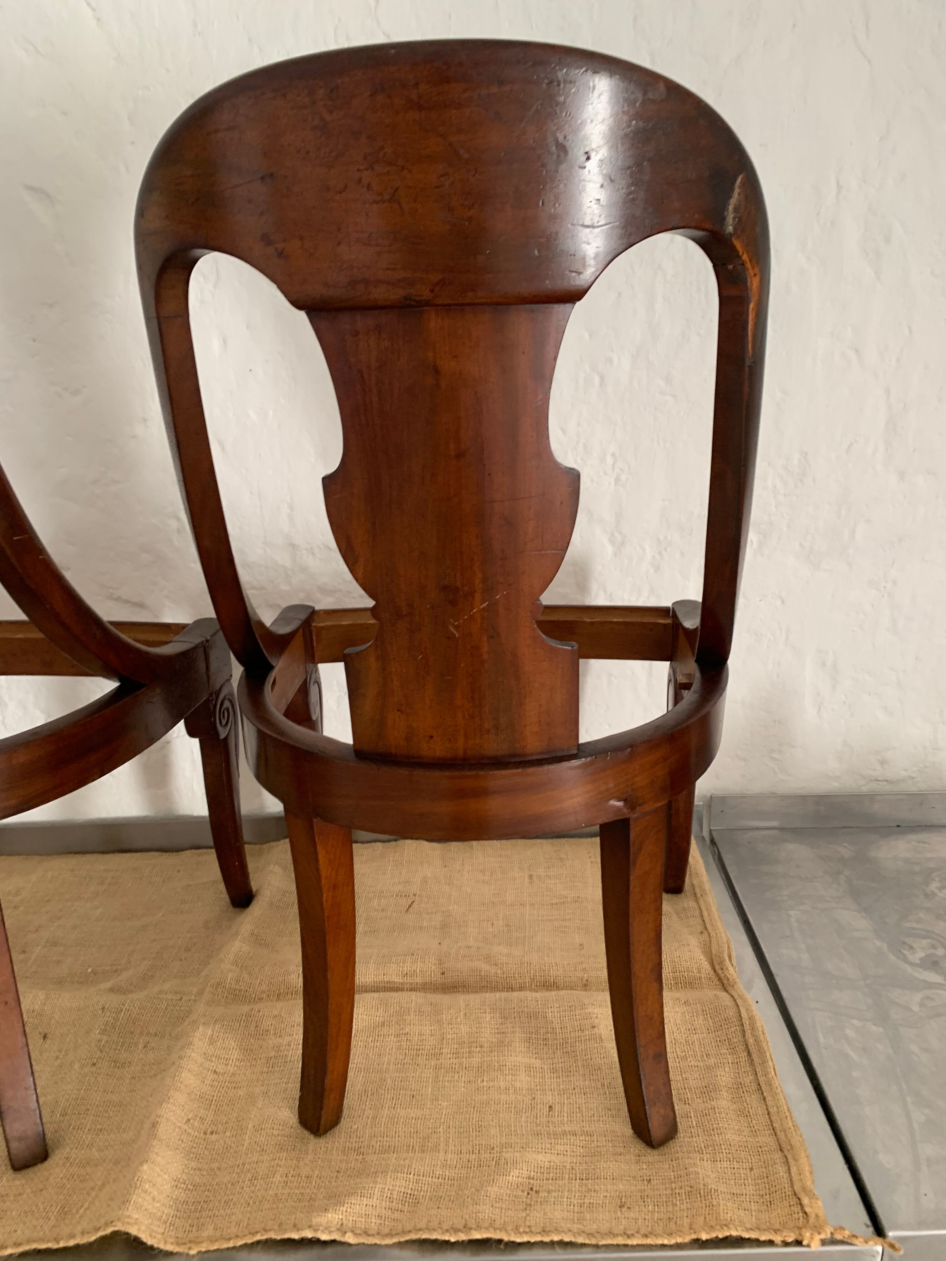 Two mahogany Empire Gondola chairs