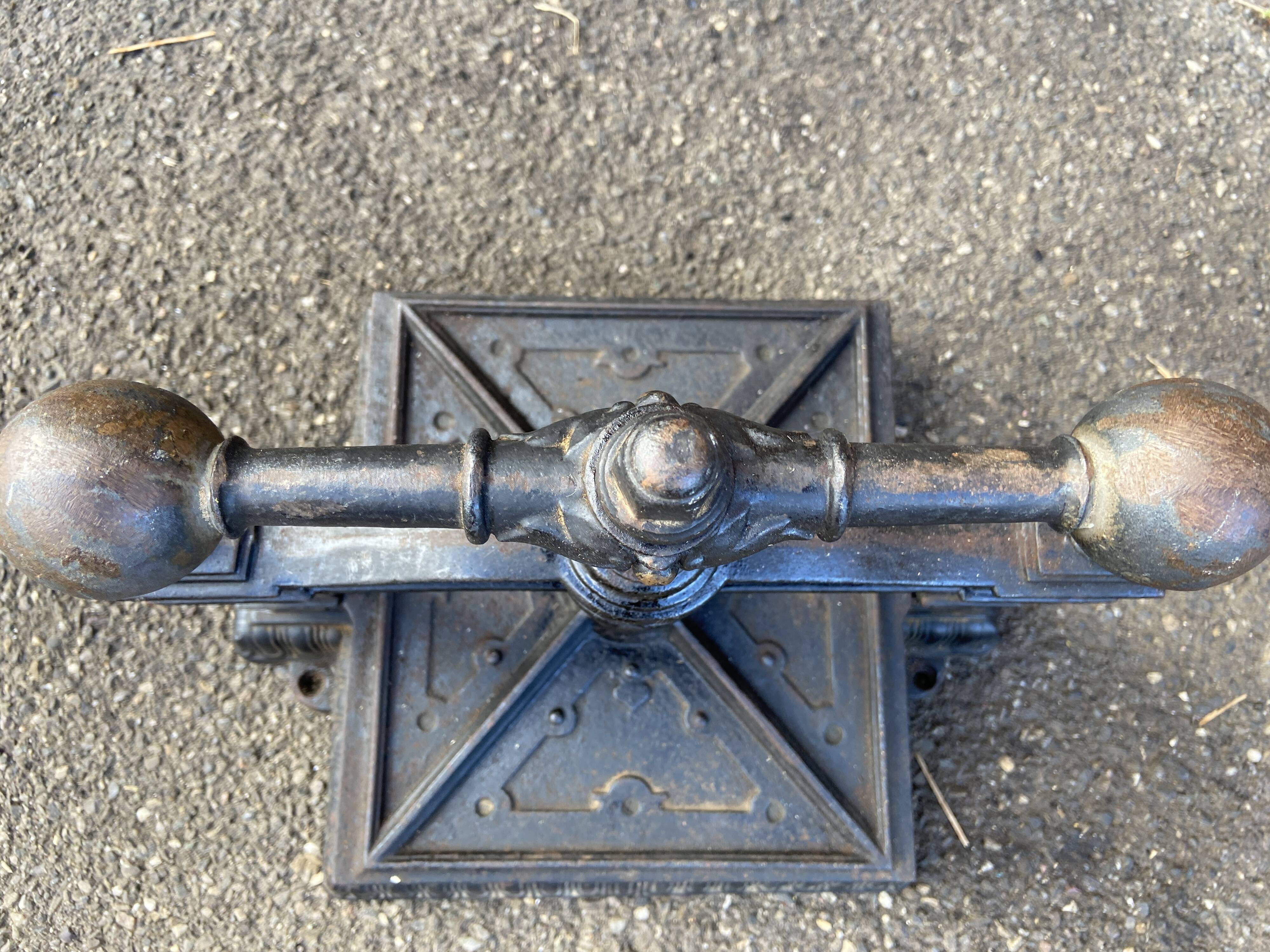 Old printing press in very old cast iron