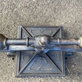 Old printing press in very old cast iron