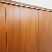 Vintage Scandinavian modernist wardrobe in teak and metal from the 1960s.