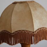 Table lamp in turned wood and umbrella-style leather lampshade