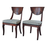 Pair of mahogany gondola chairs – Empire style – 20th century, restored