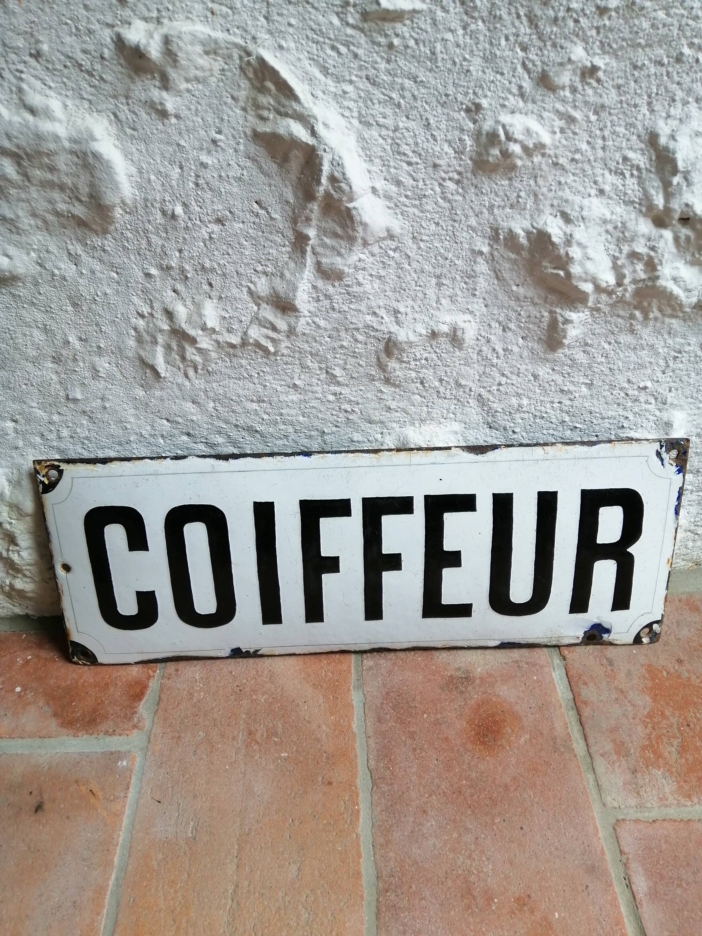 Hairdresser's advertising plate