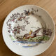 Polychrome ironstone dessert plates from Digoin and Sarreguemines.