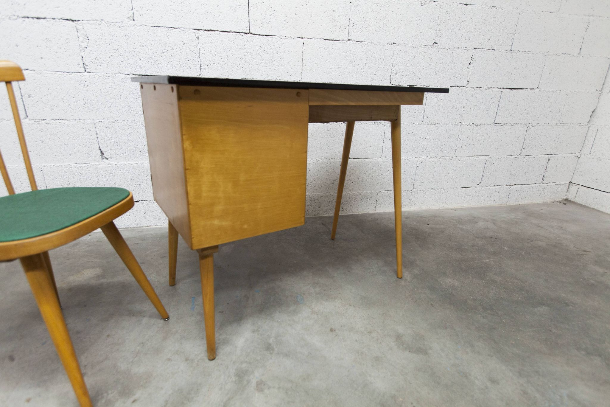 Baumann desk and chair, 1960s, Formica, wood and black, green seat