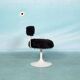 Space age design armchair from the sixties, fluffy stool with trumpet base.