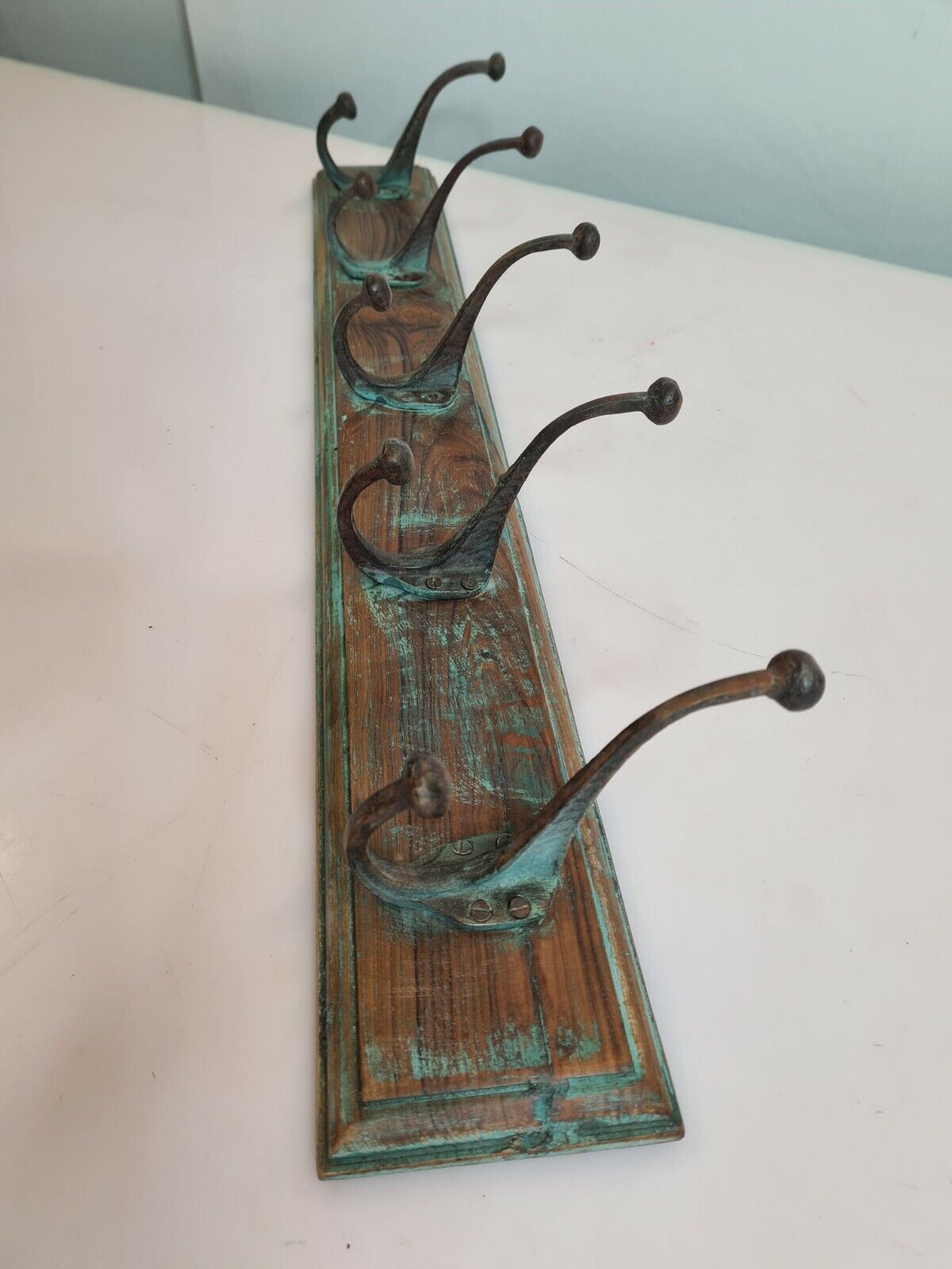 Wooden school coat rack with cast iron hooks