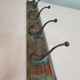 Wooden school coat rack with cast iron hooks