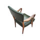 Fauteuil bas  en skaï vert bouteille