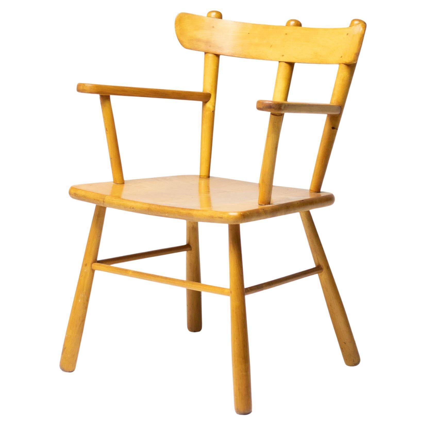 Danish organic armchair in solid birch, curved backrest, 1950s design.