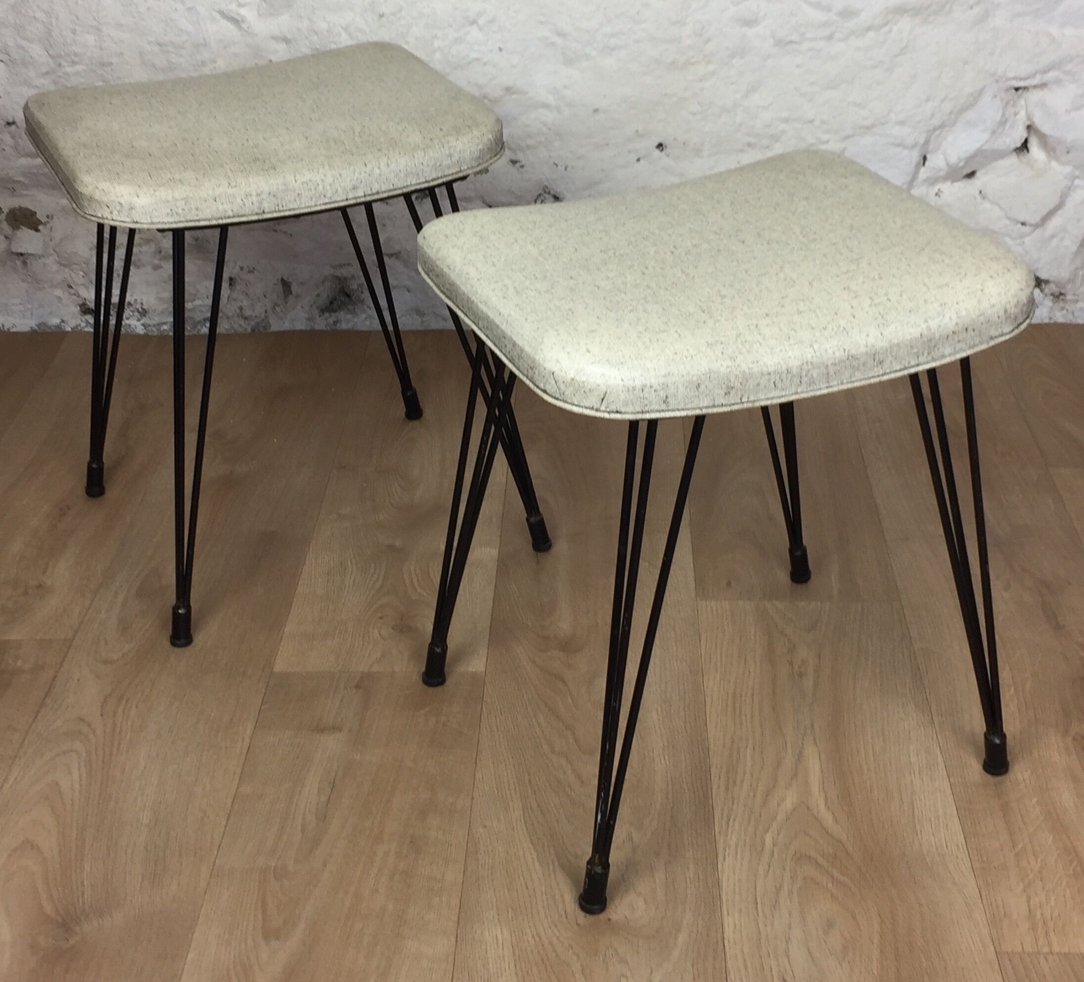Pair of Eiffel foot stools and 60s skai seating