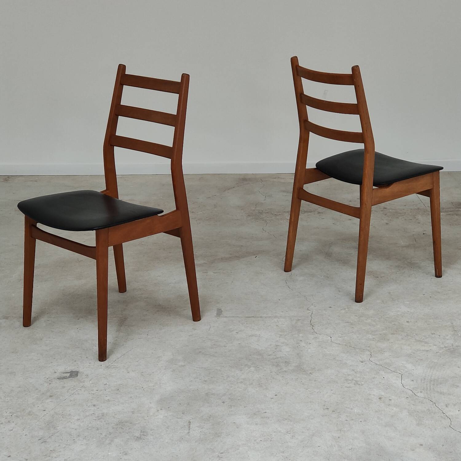 Pair of Scandinavian style leather and wood chairs 1970