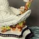Sèvres, figurine de colombe sur une branche fleurie.