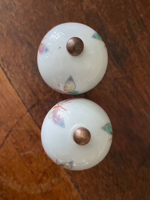 pair of antique painted porcelain knob handles