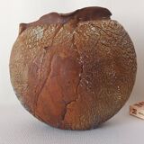 Signed textured terracotta vase